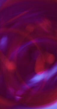Blur rainbow abstraction. Light art. Pink blue purple colorful optical gleam texture glisten luminous reflection on vibrant neon background.