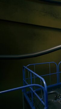 A blue scaffolding stands under an abstract wall, featuring dark hues and subtle textures. Industrial wires twist through this environment, hinting at ongoing construction or repair work.