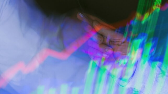 Financial growth charts and holographic data panels glowing with a rising red trend line for investment analysis and market strategy