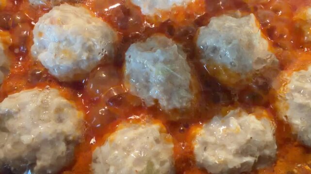 Juicy meatballs in rich tomato sauce, classic comfort food with savory gravy