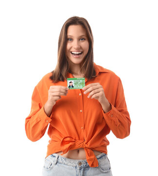 Happy young woman with driving license isolated on white background