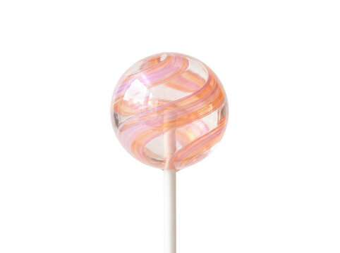 Pink and orange swirl lollipop. Round candy on a stick isolated on white background.