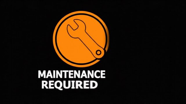 Maintenance required sign with orange wrench icon