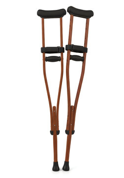 Wooden underarm crutches standing upright