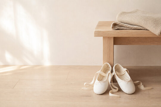 Ivory Ballet Slippers beside Folded Knit Wrap