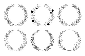 Fototapeta premium Wreaths featuring botanical illustrations provide an elegant decorative element for various design projects.
