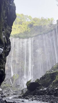 Landscape View of Tumpak Sewu Waterfall in East Java, Indonesia