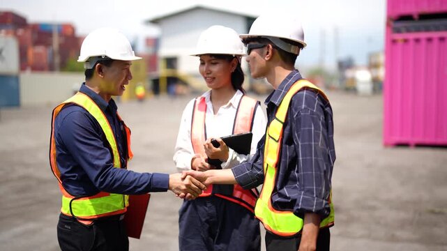 Cargo inspection worker stand between shipping containers finish warehouse activity. Supply chain management, logistics efficiency and freight handling. Cheking hand, hands together success.