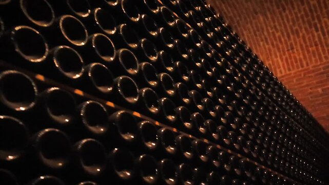 Stacked Wine Bottles in Queretaro Cellar With Brick Ceiling 