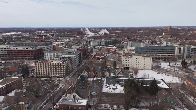 Right to Left Aerial of the East side of Milwaukee near Lake Michigan in winter