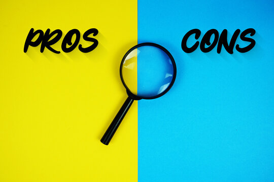 Pros vs Cons text with magnifying glass on yellow and blue background