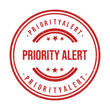 Red round rubber stamp with priority alert text and star symbols