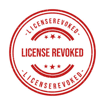 Red round rubber stamp icon with the text license revoked inside it