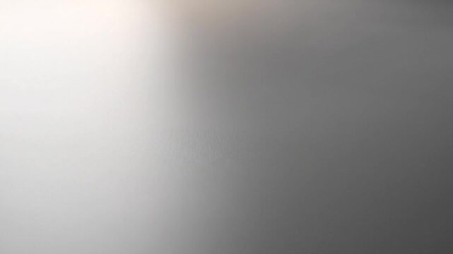 Abstract grey gradient background with soft light diffusion for modern digital design projects and minimalist creative