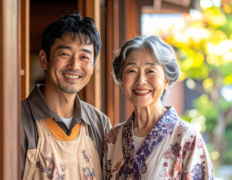 Portrait of a community welfare volunteer and smiling elderly woman after a friendly home visit