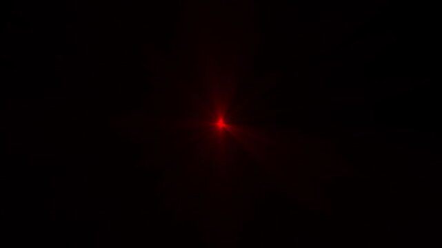 High-quality stock footage of sun rays red light effects, for desi Optical Lens flare light background. 4k video