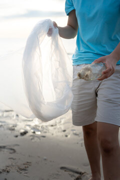 Save ocean. Volunteer pick up trash garbage at the beach and plastic bottles are difficult decompose prevent harm aquatic life. Earth, Environment, Greening planet, reduce global warming, Save world