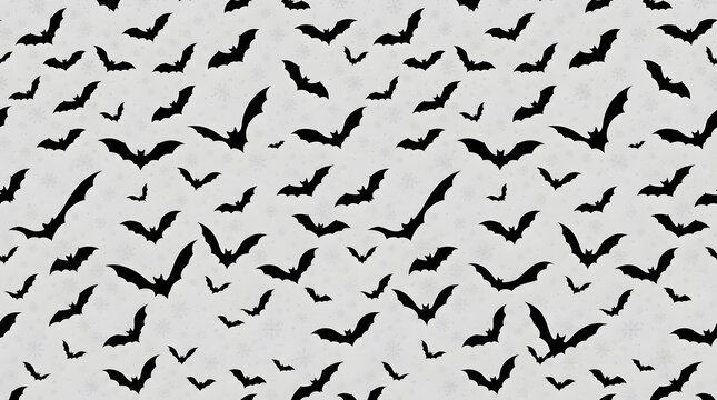 Seamless pattern of black bats on a light grey background