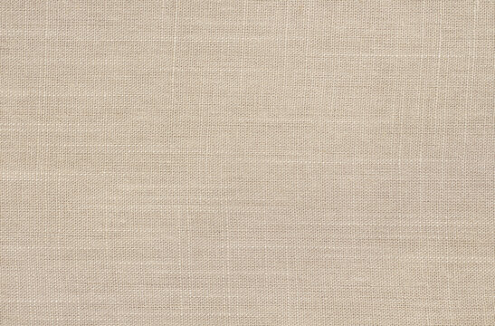 Brown linen fabric cloth texture for background, natural textile pattern.
