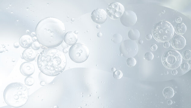 Abstract clear water bubbles essential oil beauty collagen Serum Repair cell background.	