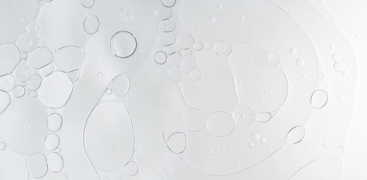 Abstract clear water bubbles essential oil beauty collagen Serum Repair cell background.	