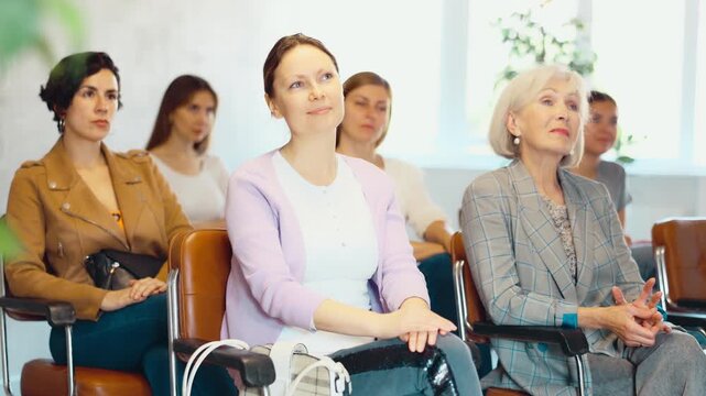 students sit in lecture center and listen intently to teacher s story about composition of theory and practice in modern medicine
