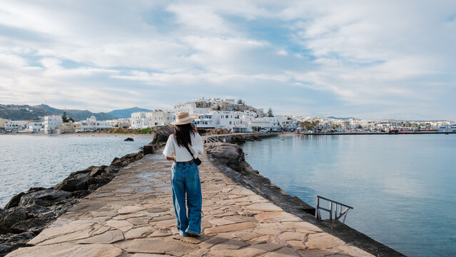 Exploring the coastal charm of Naxos, Greece on a serene afternoon