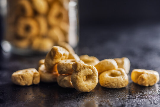 Golden Butter Cookie Rings Close-Up Stack Texture Macro Shot For Snack And Dessert Use