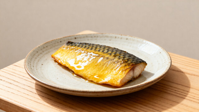 walleye. Freshly cooked golden-brown walleye fillet on ceramic plate, clean wooden countertop, healthy meal concept, menu design.