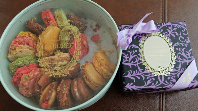 Close up paper box of Laduree- fine French macarons and artisanal pastries store from Paris, France