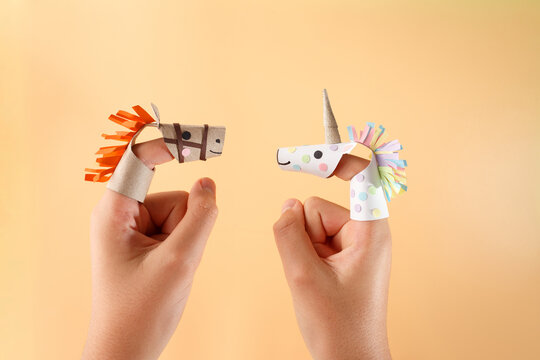 step by step DIY craft tutorial making paper finger puppets, educational handmade activity for kids and school, ideal for toy brands and children education platforms,