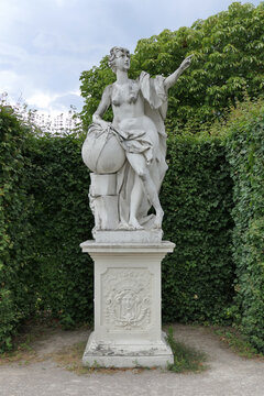 Baroque Allegorical Statue with Globe at Belvedere Palace, Vienna, Austria. 