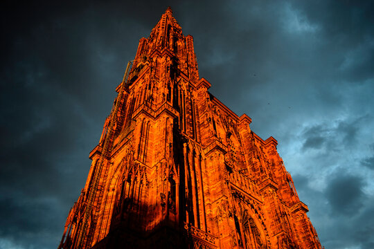 A dramatic low-angle view of the Strasbourg Cathedral