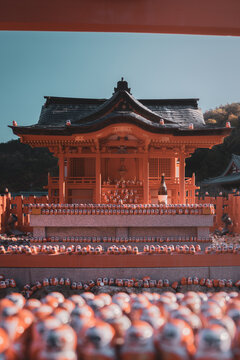 Vermillion Shrine Altar Covered in Daruma Offerings