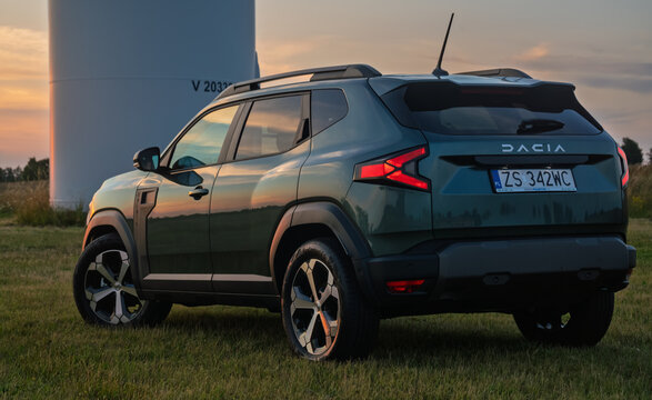 The third-generation Dacia Duster outdoors with windmills