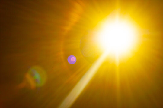 Sun flare on the black background