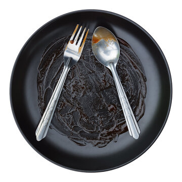 round black plate,fork and spoon stained with red sauce after finishing meal isolated on white.