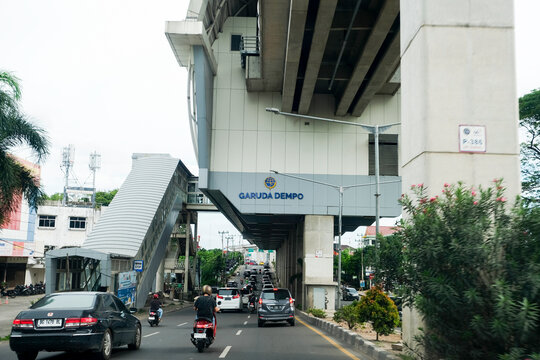 Palembang, Indonesia - March 23, 2025: Dynamic evening rush hour in the heart of Palembang