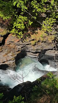 Reichenbach Falls In Switzerland During Spring Season Featuring Powerful Waterfalls, Mountain Scenery, Forest Views, Stunning Alpine Landscape. Natural Beauty, Fresh Green Nature, Famous Destination