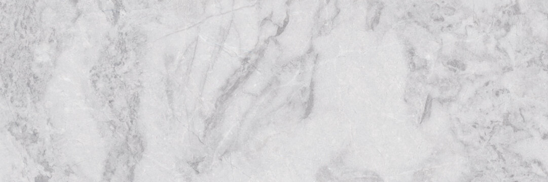 White and light gray marble texture with soft natural veining. Elegant surface for ceramic tiles, flooring, and interior design.