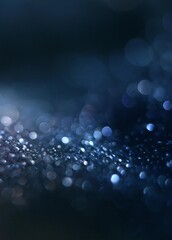Fototapeta premium Abstract background with a dark blue color. the background is filled with small, circular lights that are blurred and appear to be floating in the air.
