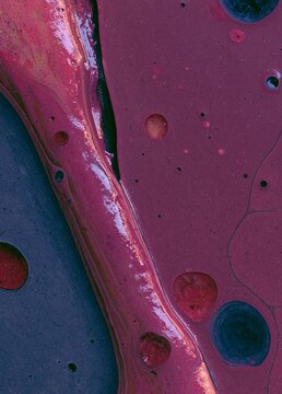 Abstract digital art piece that appears to be a close-up of a surface with a pink and purple color scheme.