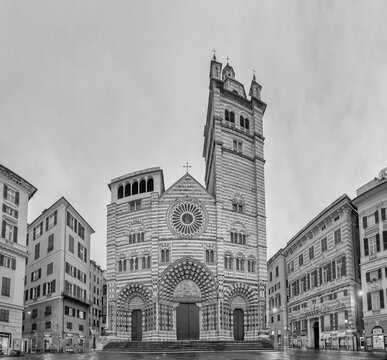Genoa Cathedral facade and tower with surrounding buildings