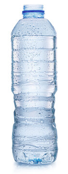 Full transparent plastic bottle of pure mineral water covered in fresh condensation drops, isolated on a white background.