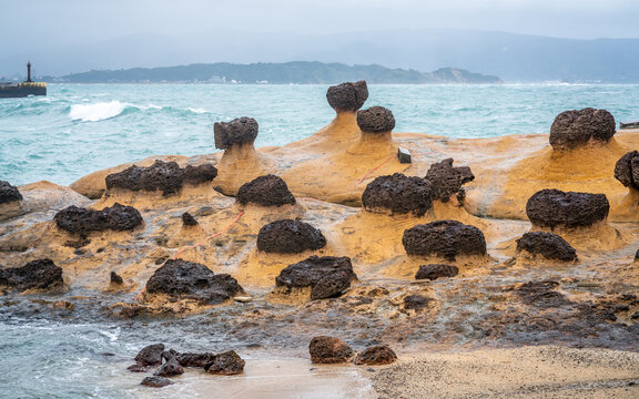 Scenic view of hoodoo stones rock formation and sea view in Yehliu geopark in New Taipei Taiwan