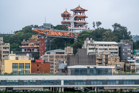 View of Zhuputan Temple of Keelung and panorama of the city buildings and tower in Keelung Taiwan