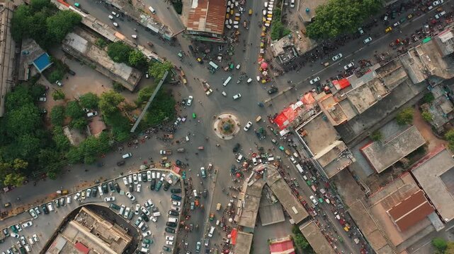 Aerial Side View of Busy Traffic Roundabout with Clock Tower in Rawalpindi Pakistan