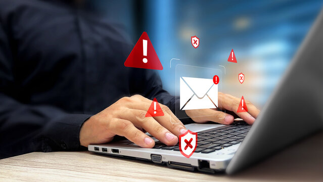 Fraud Attempts, Suspicious Emails and Scam Ads. Person Filter Inbox Filled with Spam Emails and False Advertisement on a Laptop. Caution, Warning Notifications, Malware Spreading, Hidden Viruses