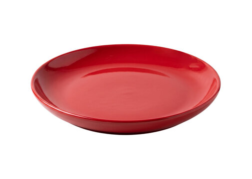 Round red ceramic dinner plate isolated on transparent background for food photography projects