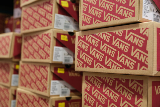 Display of shoe boxes in a store in Penang showcasing Vans brand products